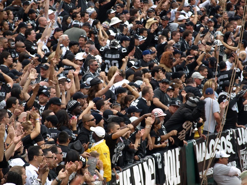 Photo of rowdy Oakland Raiders fans at Oakland Coliseum.